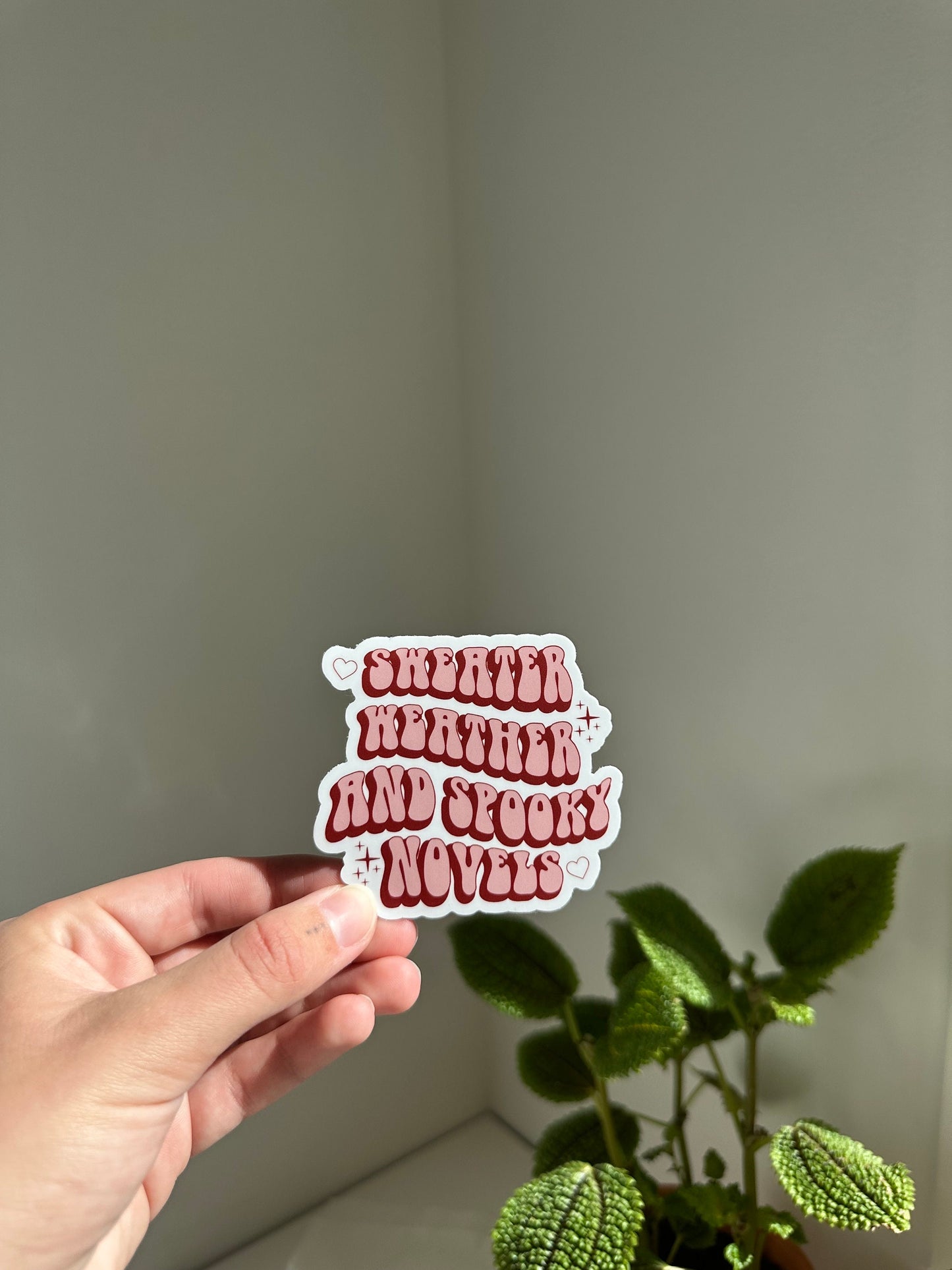 Sweater Weather and Spooky Novels Sticker