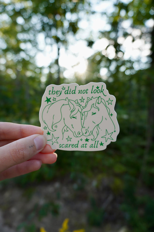 They did not look scared at all sticker