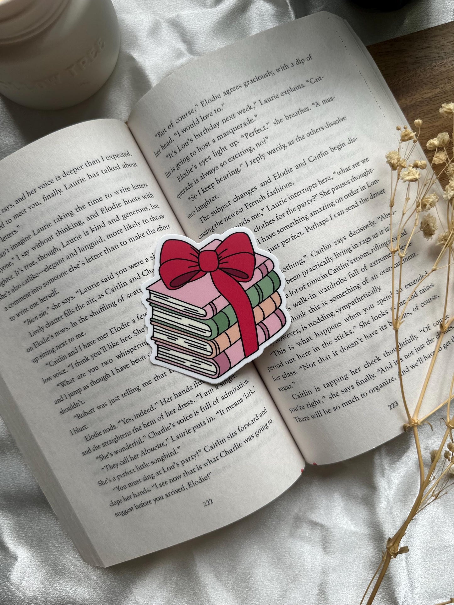 Holiday Book Stack with a Bow Sticker