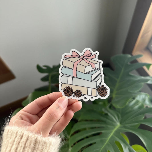 Pastel Winter Book Stack With Bow Sticker