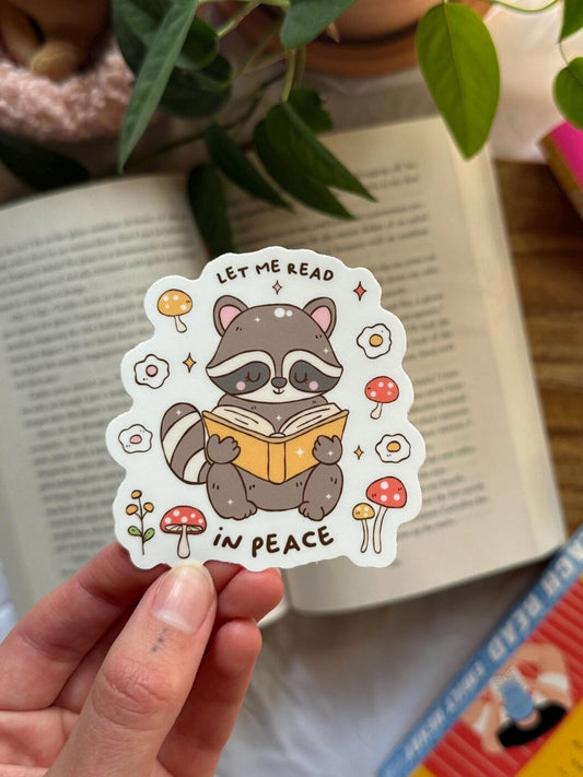 Let Me Read in Peace Raccoon Sticker