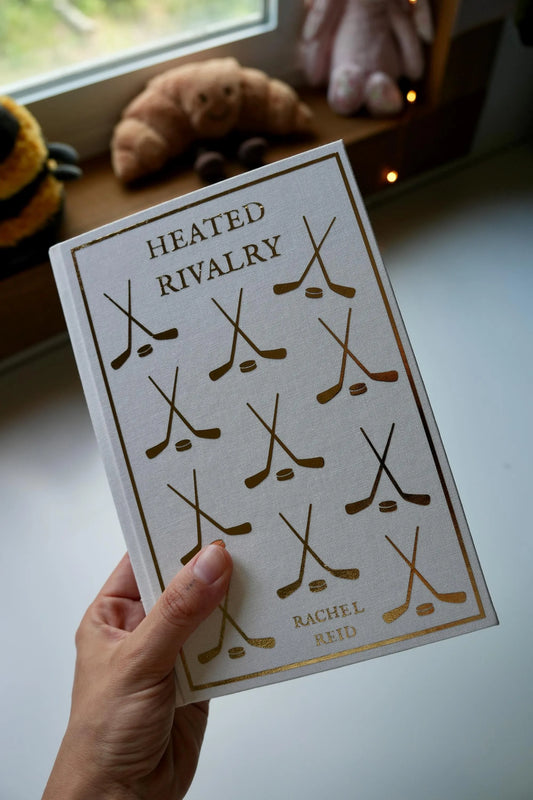 Heated Rivalry by Rachel Reid Hardcover Rebind